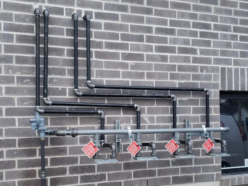 Gas meter and supply line connection at a residential property