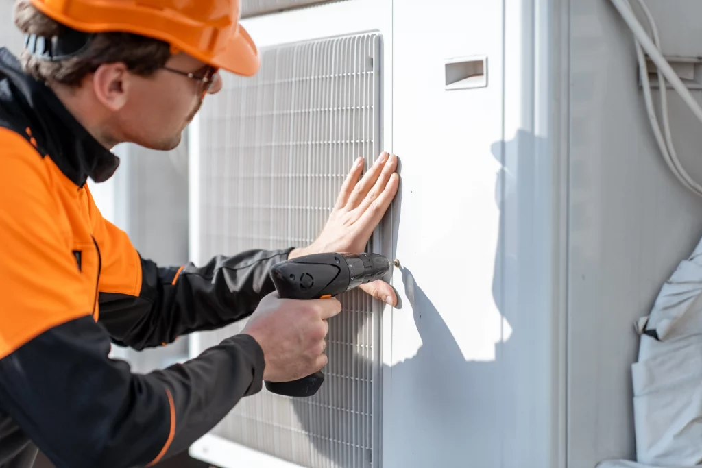 Technician installation a new air conditioning unit in Waterloo